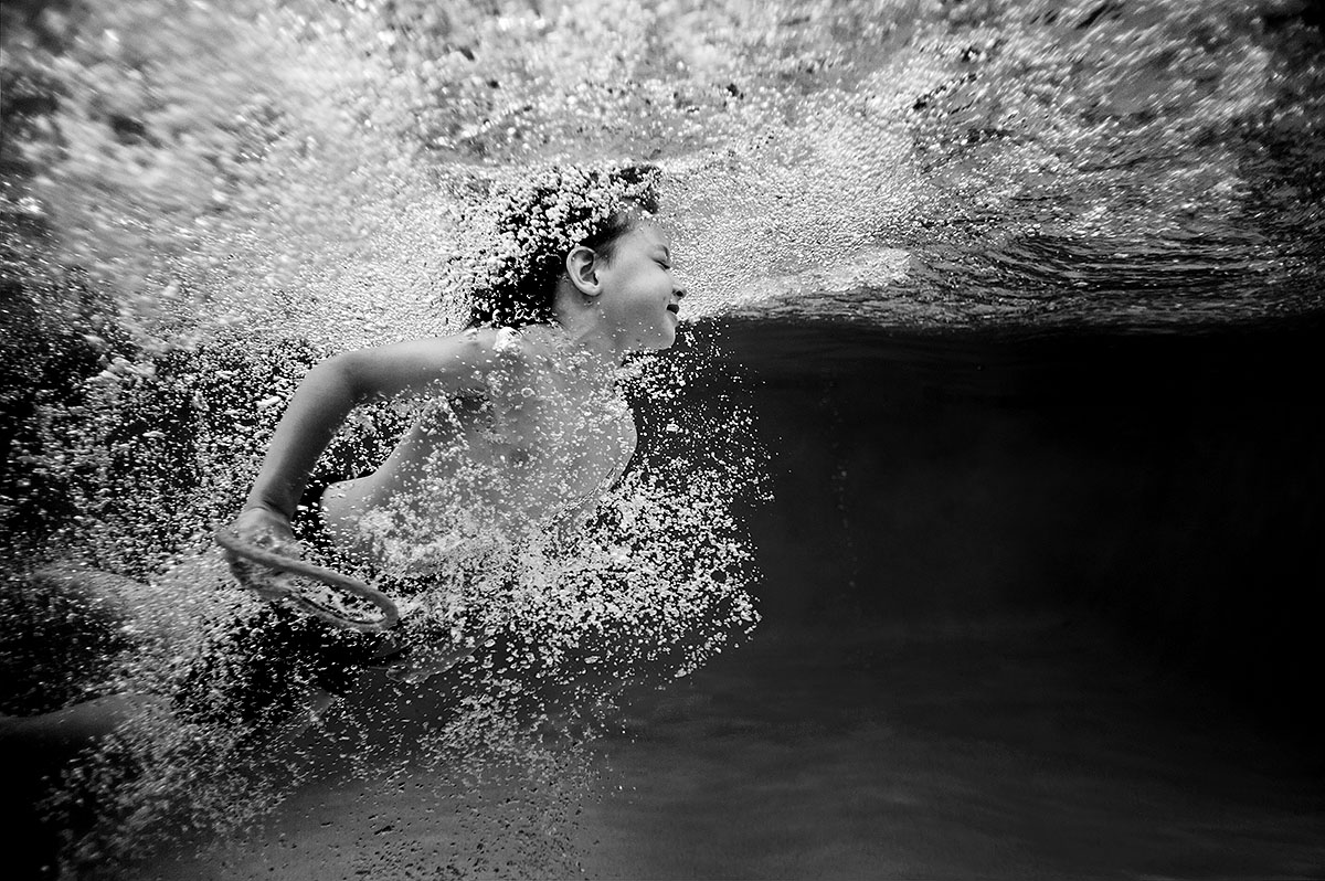 photographs of child swimming