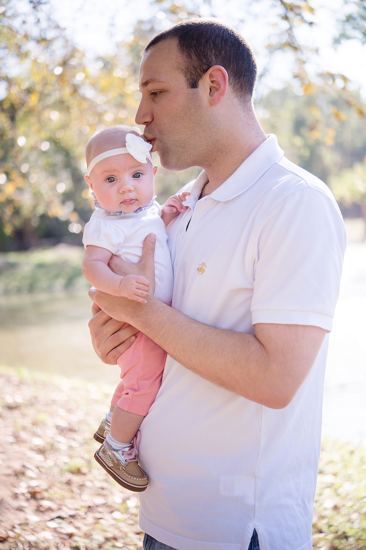 daddy kissing baby girl picture